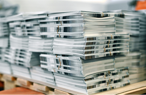 stacks of paper on a pallet