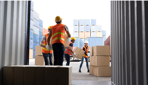 workers moving boxes