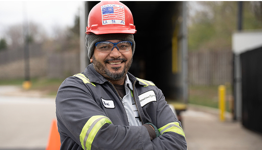 worker with arms crossed