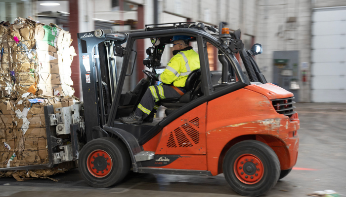 forklift moving bales
