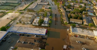 An aerial view of a flooded town 