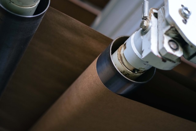 a close up of containerboard in a manufacturing process