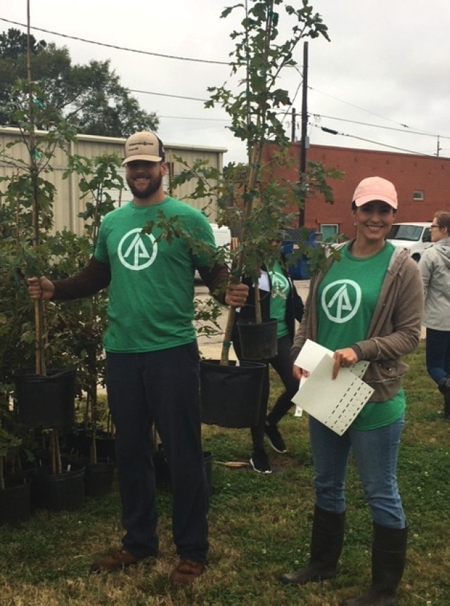 IP volunteers distribute free trees after a hurricane along with Arbor Day Foundation