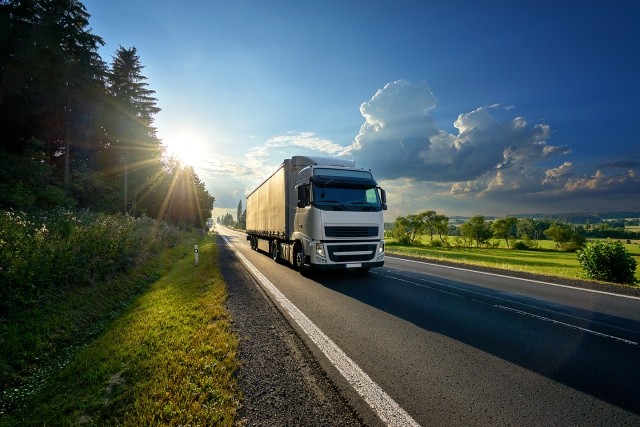 A semi-truck transports goods in Europe