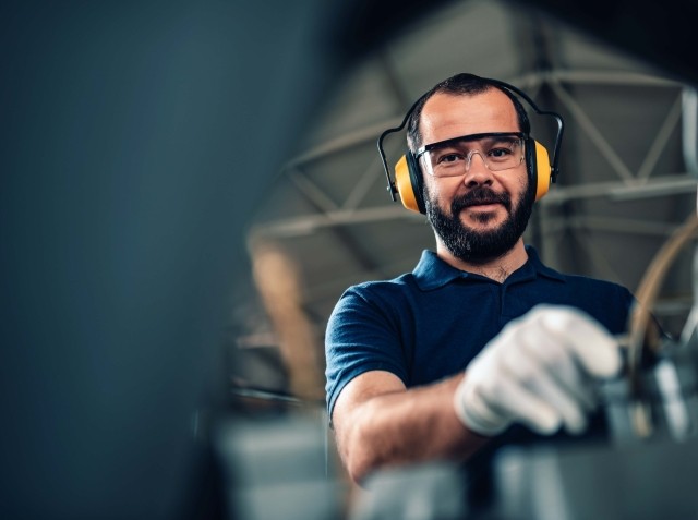 A European man in a manufacturing environment