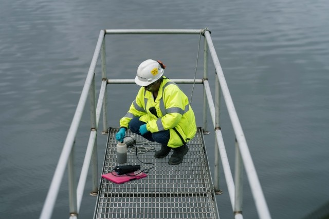 An International Paper employee performs environmental analysis.