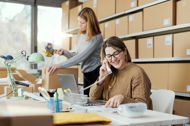 eCommerce Customers with Boxes on Shelves