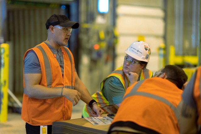 mill workers talking