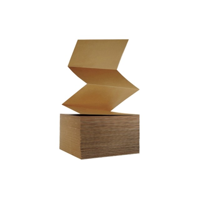 A stack of corrugated fanfold unfolding from the top