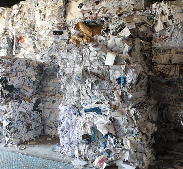 bales of different paper sheets