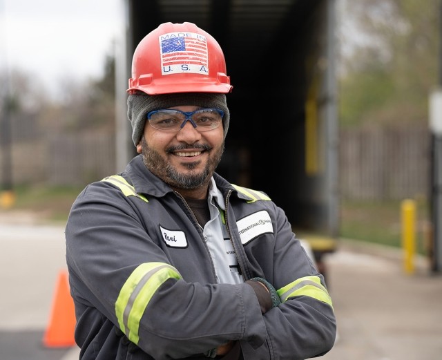 worker with arms crossed